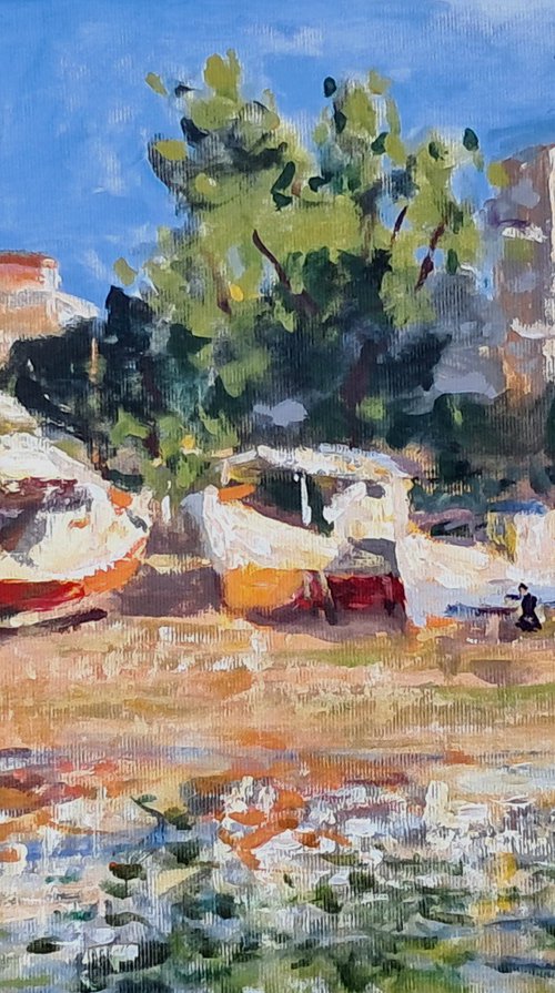 Boat reflections by Dimitris Voyiazoglou