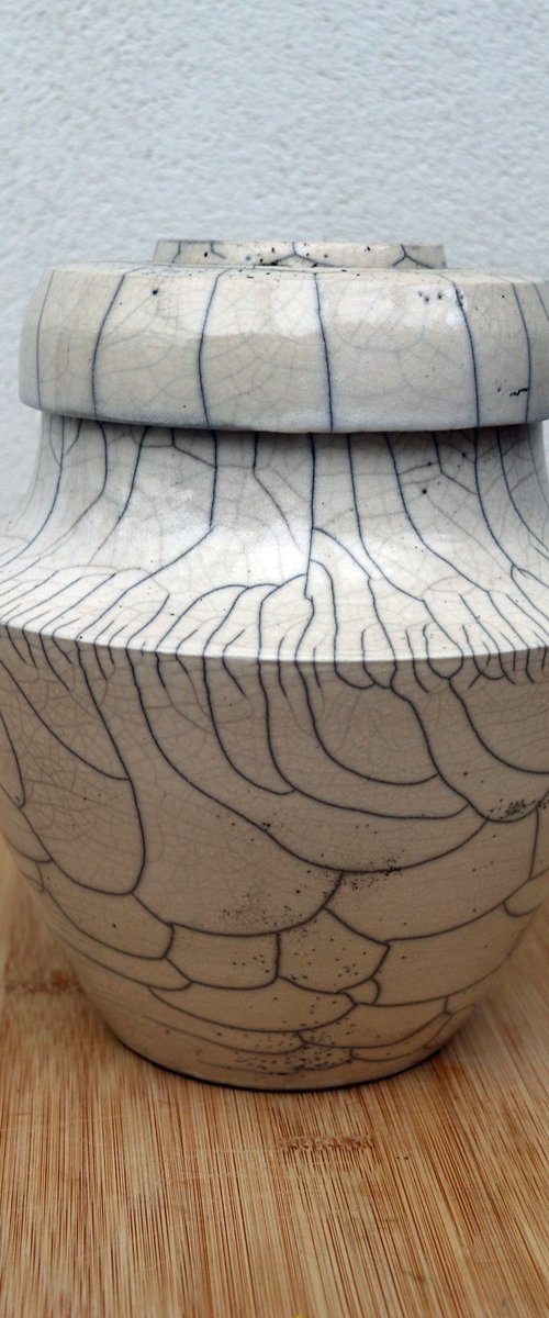 Raku vessel with lit by Koen Lybaert